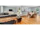 Bright, open-concept living and dining area with hardwood floors at 1416 Glencoe Dr, Mount Pleasant, SC 29464