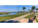 Relaxing walkway views with Palm trees and park benches offering peaceful area to relax and admire the view at 1416 Glencoe Dr, Mount Pleasant, SC 29464