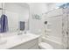 Bright bathroom featuring a white vanity, commode and shower/tub combination at 148 Haverhill St, Summerville, SC 29486
