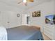 Spacious bedroom featuring a TV, closet doors, and ceiling fan at 148 Haverhill St, Summerville, SC 29486