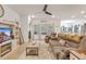 Inviting living room with plush seating, a ceiling fan, and lots of light creating a comfortable space at 148 Haverhill St, Summerville, SC 29486