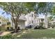 A backyard view featuring a well-maintained lawn, deck, and white exterior at 1517 Faith St, Mount Pleasant, SC 29466