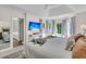 Sunlit main bedroom with a sitting area and an ensuite bathroom at 1517 Faith St, Mount Pleasant, SC 29466
