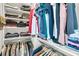 Neatly organized walk-in closet with shelving and hanging rods for ample storage at 1517 Faith St, Mount Pleasant, SC 29466