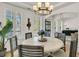 Bright dining room with natural light, a round table, seating for six, and modern decor at 1517 Faith St, Mount Pleasant, SC 29466