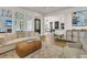 Open-concept living area with hardwood floors, connecting to a breakfast nook and modern kitchen at 1517 Faith St, Mount Pleasant, SC 29466