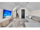 Cozy living room features a comfortable gray couch and a large television at 1517 Faith St, Mount Pleasant, SC 29466