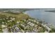 Breathtaking aerial view of a waterfront community with private docks and lush landscaping near the Ravenel Bridge at 1527 Wando View St, Charleston, SC 29492