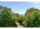 Backyard featuring view of lake surrounded by mature trees at 1527 Wando View St, Charleston, SC 29492