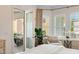 Cozy bedroom with access to a private deck and lots of natural light at 1527 Wando View St, Charleston, SC 29492