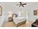 Bright bedroom featuring ceiling fan, access to porch and stylish appointments at 1527 Wando View St, Charleston, SC 29492