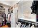 Well-organized walk-in closet featuring custom shelving and ample storage space at 1527 Wando View St, Charleston, SC 29492