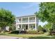 Charming two-story home featuring double porches, manicured landscaping, and a welcoming entrance at 1527 Wando View St, Charleston, SC 29492