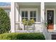 Charming porch with flower box and comfortable chairs at 1527 Wando View St, Charleston, SC 29492