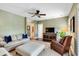 Living room featuring plush seating, decorative pillows, and neutral-toned walls at 1527 Wando View St, Charleston, SC 29492
