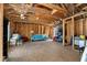 Unfinished room with exposed wooden beams and partial framing at 1527 Wando View St, Charleston, SC 29492