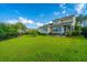 Expansive backyard with lush green lawn and patio area, perfect for outdoor entertaining and recreation at 1545 Calaveras Cir, Mount Pleasant, SC 29466