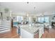 Stylish kitchen island overlooking dining and living spaces, featuring stainless steel appliances at 1545 Calaveras Cir, Mount Pleasant, SC 29466