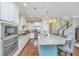 Modern kitchen with stainless steel appliances, granite counters and island, plus pendant lighting at 1545 Calaveras Cir, Mount Pleasant, SC 29466