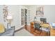 Bright and modern home office with a spacious desk, comfortable seating, and stylish decor, perfect for productivity at 1545 Calaveras Cir, Mount Pleasant, SC 29466