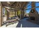 Community gathering place with fireplace, picnic tables, and exposed beam ceiling at 1545 Calaveras Cir, Mount Pleasant, SC 29466
