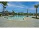 Community pool with zero entry, sun loungers, and a covered patio at 1545 Calaveras Cir, Mount Pleasant, SC 29466