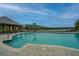 Spacious community pool with gazebo and ample seating overlooking a scenic lake at 1545 Calaveras Cir, Mount Pleasant, SC 29466