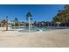 Community pool with splash features, covered seating, and palm trees, providing a resort-like experience at 1545 Calaveras Cir, Mount Pleasant, SC 29466