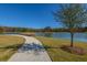Picturesque community walking path along the water with lush landscaping at 1545 Calaveras Cir, Mount Pleasant, SC 29466