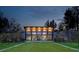 Striking clubhouse featuring modern architecture, floor-to-ceiling windows, and outdoor seating areas at 1575 Trailmore Ln, Summerville, SC 29486