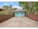 Detached garage featuring double doors and a brick facade at 1603 Culpepper Cir, Charleston, SC 29407