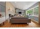 Open-concept living room features a modern fireplace, hardwood floors, and plenty of natural light at 1603 Culpepper Cir, Charleston, SC 29407