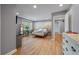 Spacious main bedroom with light wood floors, a mural, and ample natural light at 1603 Culpepper Cir, Charleston, SC 29407