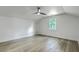 Bedroom features luxury vinyl plank flooring, ceiling fan, white walls and a window at 169 Southwold Cir, Goose Creek, SC 29445