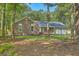 Charming brick ranch home nestled among mature trees on a spacious lot at 169 Southwold Cir, Goose Creek, SC 29445