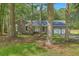 Charming brick ranch home featuring mature trees and a welcoming front entrance at 169 Southwold Cir, Goose Creek, SC 29445