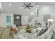 Cozy living room showcases a brick fireplace, comfortable seating, and an inviting atmosphere at 169 Southwold Cir, Goose Creek, SC 29445