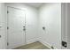 Mud room with luxury vinyl plank flooring, white walls, and a white door with a lock at 169 Southwold Cir, Goose Creek, SC 29445