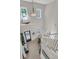 Bright foyer with beautiful chandelier, staircase, and views from the windows and entrance at 1761 Old Military Rd, Charleston, SC 29412