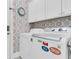 Functional laundry room featuring a modern washer and dryer at 1761 Old Military Rd, Charleston, SC 29412