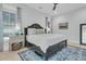 Inviting main bedroom featuring a ceiling fan, stylish furnishings and an accent rug at 1761 Old Military Rd, Charleston, SC 29412
