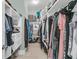 Spacious walk-in closet with custom shelving for optimal storage at 1761 Old Military Rd, Charleston, SC 29412
