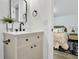 Bathroom featuring a modern vanity with black hardware and a view into the bedroom at 1915 Quitman St, North Charleston, SC 29405