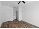 A bright bedroom featuring white trim and wood flooring at 1989 Groveland Ave, North Charleston, SC 29405