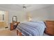 Comfortable bedroom featuring an adjacent vanity and a light-colored ensuite at 2011 N Highway 17 # 1400P, Mount Pleasant, SC 29466
