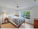 Well-lit bedroom with a ceiling fan and view of the balcony at 2011 N Highway 17 # 1400P, Mount Pleasant, SC 29466