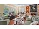 Cozy living room with a fireplace, built-in shelves, and comfortable seating arrangement at 2011 N Highway 17 # 1400P, Mount Pleasant, SC 29466