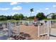 Community patio with lounge chairs and tables overlooking a lake at 2011 N Highway 17 # 1400P, Mount Pleasant, SC 29466