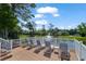 Community patio with lounge chairs overlooking a lake with fountain at 2011 N Highway 17 # 1400P, Mount Pleasant, SC 29466