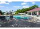 Resort style community pool and clubhouse with lounge chairs and lush landscaping at 2011 N Highway 17 # 1400P, Mount Pleasant, SC 29466
